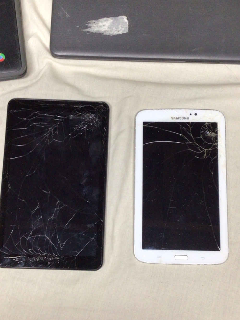 Samsung White Tablet with Visible Cracked Screen. Computer parts lot , parts lot